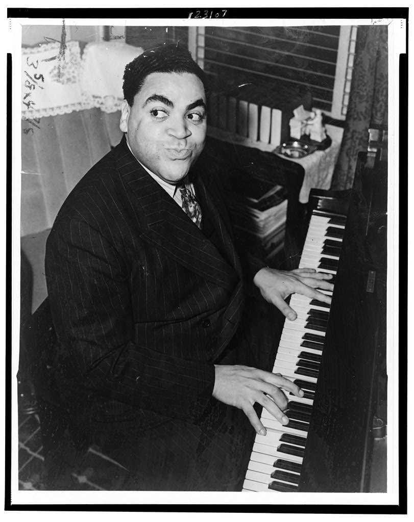 fats-waller-three-quarter-length-portrait-seated-at-piano-facing-front-world